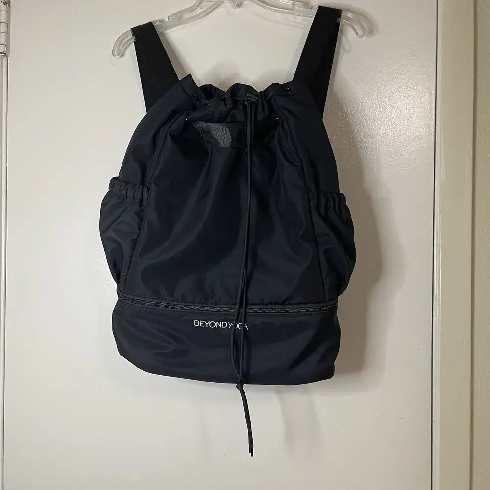 Beyond Yoga convertible gym bag black backpack with drawstring closure